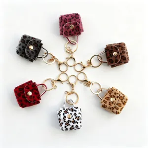 Luipaardprint pluche mini portemonnee sleutelhanger, schattige harige tas hanger goud.