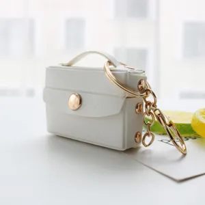 Mini borsa porta auricolari in pelle bianca portachiavi simpatico portamonete ciondolo per borsa