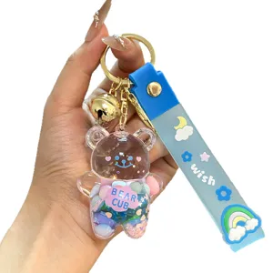 Liquid quicksand bear keychain detail, cute bag charm and car key accessory display