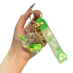 Niedlicher flüssiger Treibsand Bubble Tea Schlüsselanhänger Acryl Taschenanhänger mit Glocke