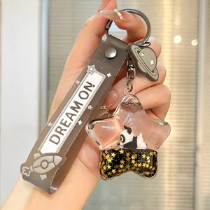 Quicksand liquid star keychain with cute panda charm, perfect bag pendant and accessory.
