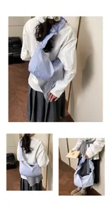 Detail view of the lightweight casual pleated slouchy shoulder bag, perfect for daily commuting.