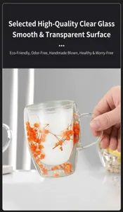 Detailed view of double wall glass cup featuring beautiful orange dried flowers inside.
