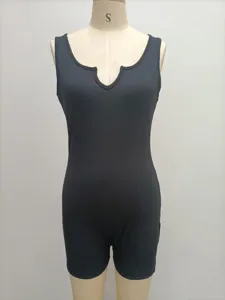 Detail view of women's black ribbed knit V-neck tank romper, casual slim fit shorts.