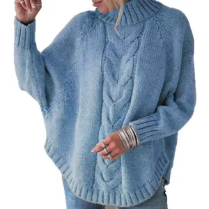 Close-up detail of women light blue turtleneck cable knit batwing sweater with cozy relaxed fit.