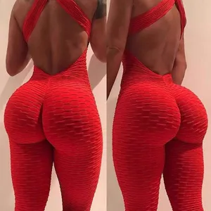 Back detail view of red seamless one-piece yoga jumpsuit, showing textured scrunch butt design.