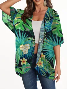 Detail shot of the tropical floral chiffon kimono cardigan, lightweight fabric and print.