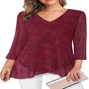 Detail shot of women burgundy v-neck three-quarter sleeve blouse with elegant floral pattern.
