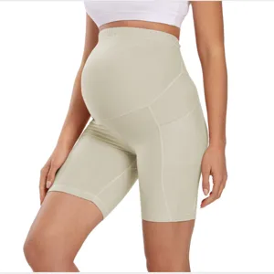 High waist maternity yoga shorts detail view, belly support breathable fabric fit.
