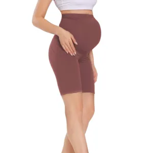 High waist maternity yoga shorts with convenient side pockets for workout and fitness.