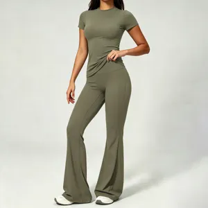 Women's olive green short sleeve slim fit crop top and high waist flare yoga pants set.