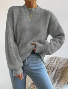 Effen gebreide trui met lange mouwen en opstaande kraag voor dames, comfortabele casual stijl.