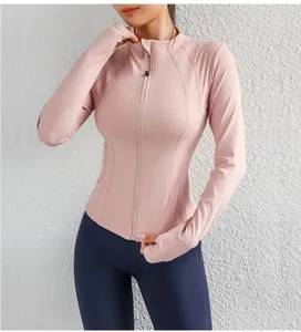 Women slim fit athletic zip up jacket detail view, pink yoga fitness long sleeve sportswear.