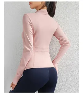 Back detail of women's pink athletic zip jacket, showing slim fit, high collar and seams.