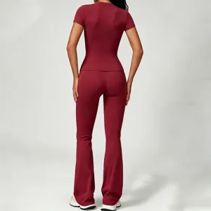 Burgundy short sleeve top and high waist flared yoga pants set for women, soft fitness activewear.