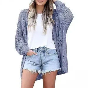 Detailed view of women's long sleeve hollow knit cardigan sweater fashion apparel style.