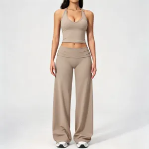 Halter crop top and wide-leg yoga pants set, activewear detail view, comfortable stretch fabric.