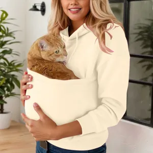 Beige pet hoodie detail showing large front pouch with cat inside for cozy casual wear.