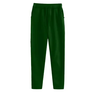 Detail view of solid dark green fleece-lined casual sweatpants with adjustable drawstring waist.
