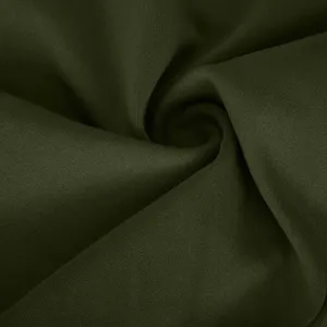Dark green activewear fabric detail close-up for women yoga pants soft stretch material