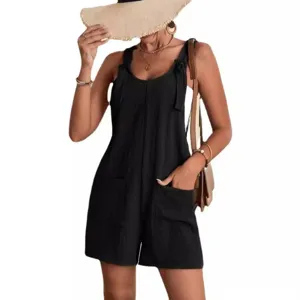 Mujer verano casual sólido negro tirantes pantalones cortos mono con bolsillos y elegantes lazos.
