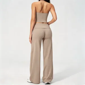 Khaki halter yoga set for women, backless fitness crop top and folded waist wide leg pants.