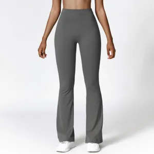 High-waisted flared yoga pants for women, stretchy fitness leggings, dark grey activewear.