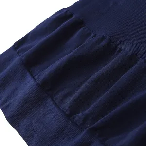 Detail view of mens compression shapewear fabric, high elasticity texture, blue.