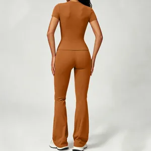 Detailed back view of caramel brushed naked-feeling yoga set short sleeve and flare pants.