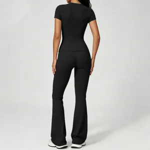 Black short sleeve top and high waist flared yoga pants set, slim fit athletic wear for women.