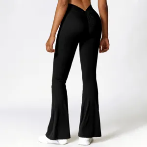 Detailed view of black high-waist V-waist flare yoga pants with scrunch butt lift feature.