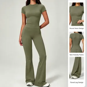 Women solid color short sleeve slim yoga top and high waist flared pants fitness set
