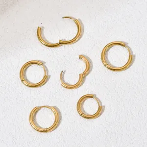 Gold hoop earrings components, minimalist round metallic jewelry findings for DIY crafts.