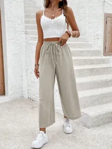 Casual loose drawstring straight pants for women, solid color comfortable everyday wear.