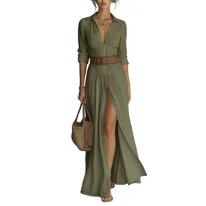 Olive green long sleeve maxi shirt dress with high waist, pleats, front slit and brown belt.