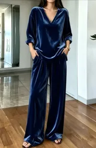 Dark blue velvet two-piece set featuring a V-neck long-sleeve top and wide-leg pants.
