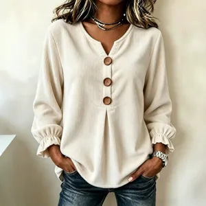 Women's chic corduroy long sleeve V-neck top with cute wooden buttons and ruffled cuffs.