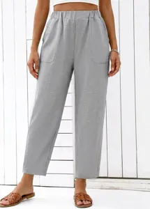 Grey high waist casual straight trousers detail showing soft drape fabric and side pockets.