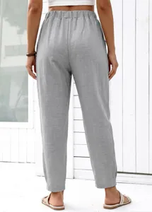 Detail shot of women grey casual pants featuring high elastic waist and straight drape back.