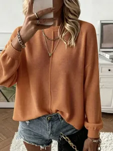 Jersey de punto de manga larga con cuello redondo liso y holgado para mujer en primavera.