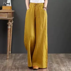 Detail shot of the vintage ramie wide-leg pants featuring a high elastic waist and pockets.