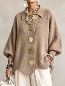 Detail shot of women's French lapel metal button cardigan, loose solid knitwear.
