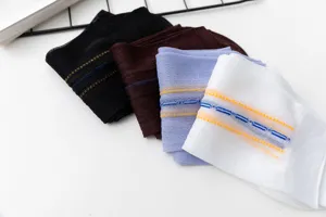 Detailed view of lightweight nylon jacquard socks for seniors, featuring colorful striped patterns.