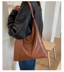 Vintage grote capaciteit schoudertas tote voor dames, stijlvolle bruine casual tas.