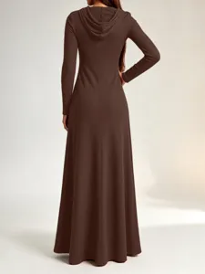 Detail view of the dark brown ribbed knit hooded maxi dress showing back texture and fit.