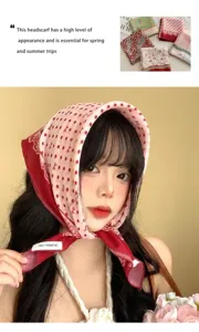 Close-up detail of french vintage pink polka dot triangle headscarf, perfect for holiday resort styling.