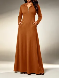 Detailed view of the ribbed long sleeve hooded maxi dress with front zipper and side pockets.