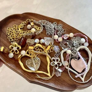 Handmade Y2K beaded ribbon heart necklace detail showcasing trendy multi-layer jewelry set.