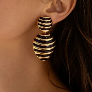 Vintage gold black enamel drop earrings French style chic geometric striped ear jewelry detail view