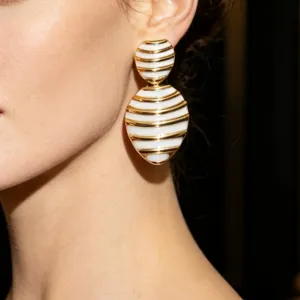 Vintage gold-tone white enamel striped statement drop earrings, elegant French design jewelry.